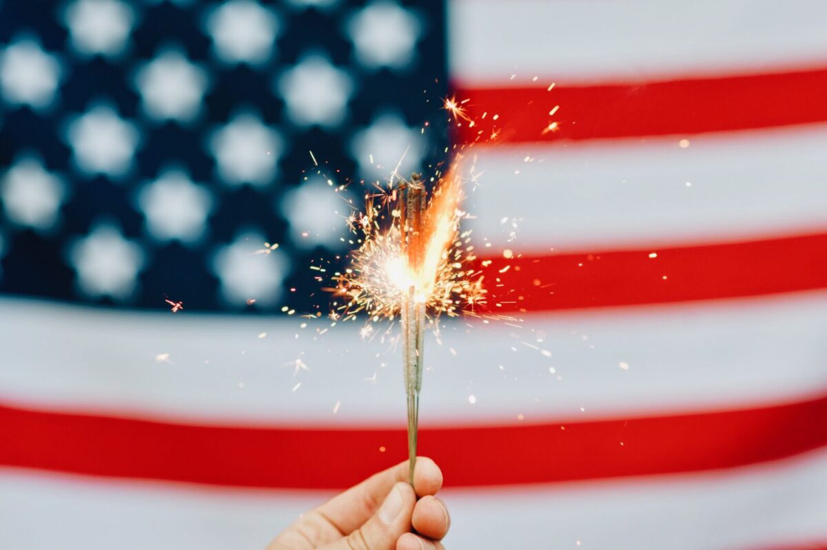 american flag with sparkler